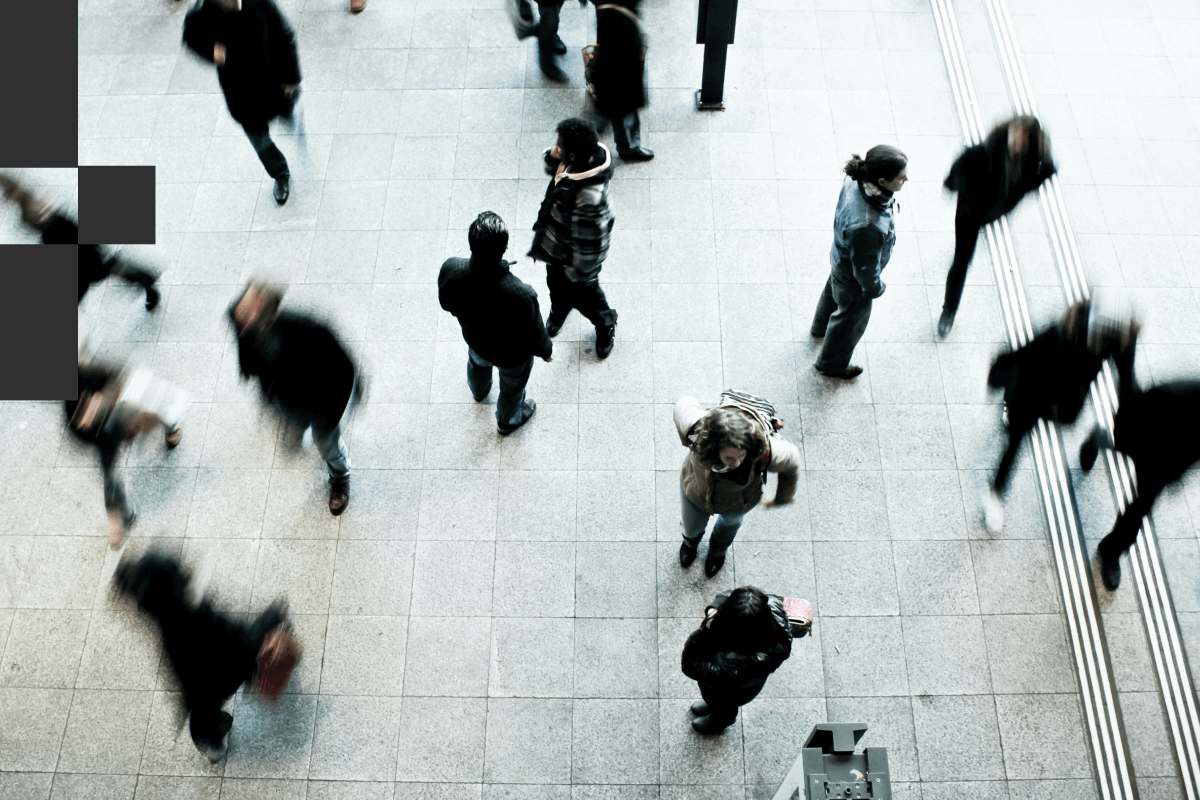 People walking across a floor