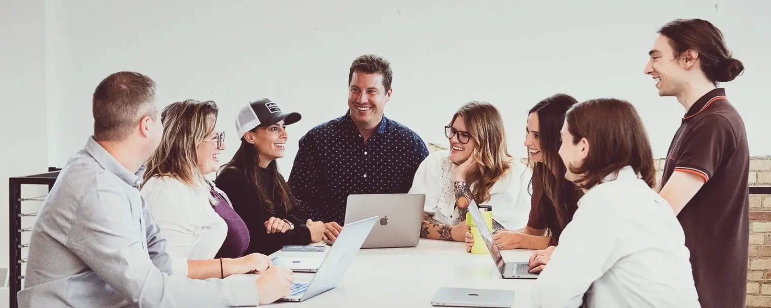 group chatting around table