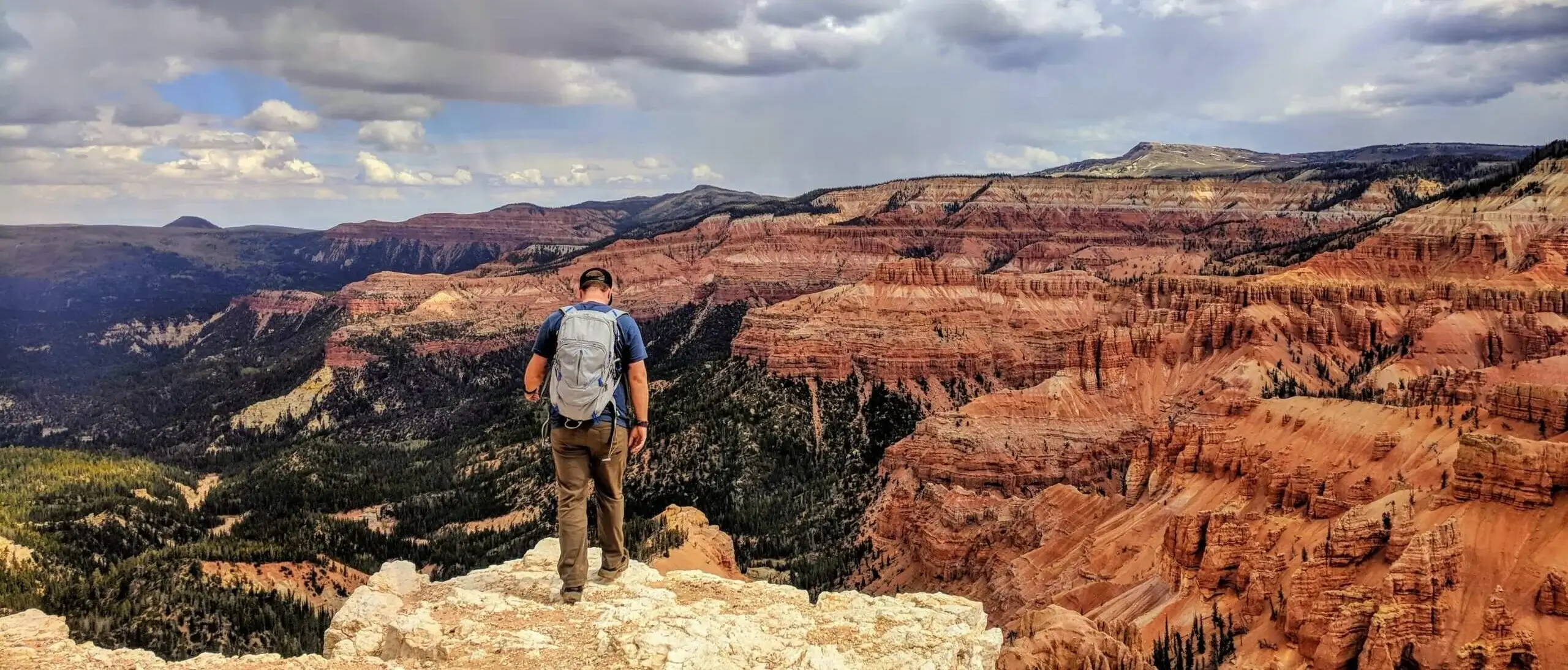 Man on top of mountain range