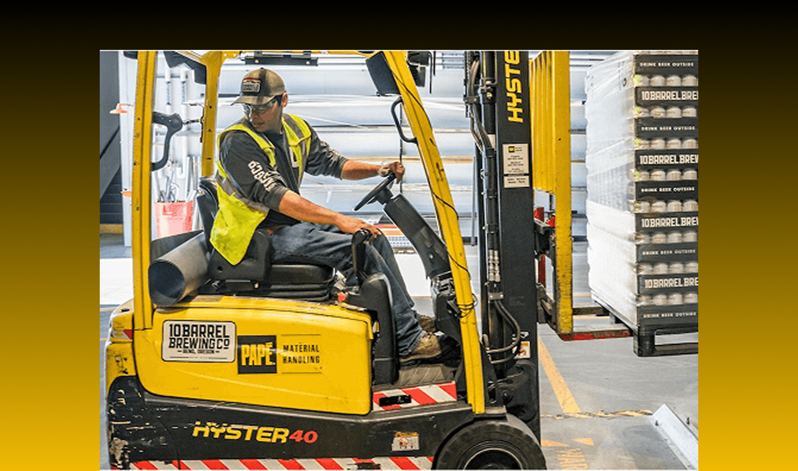 forklift driver looking behind them